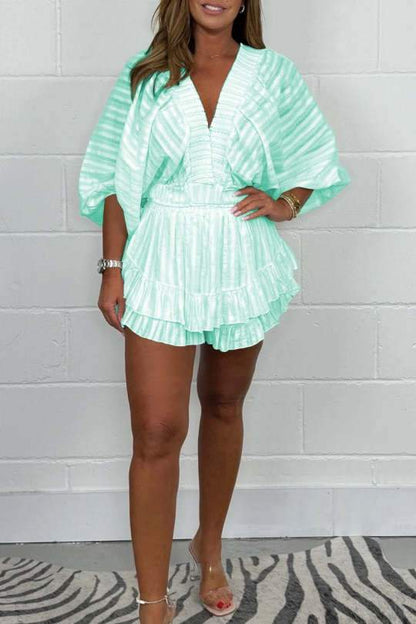 Women's v neck detail top and frilly shorts set