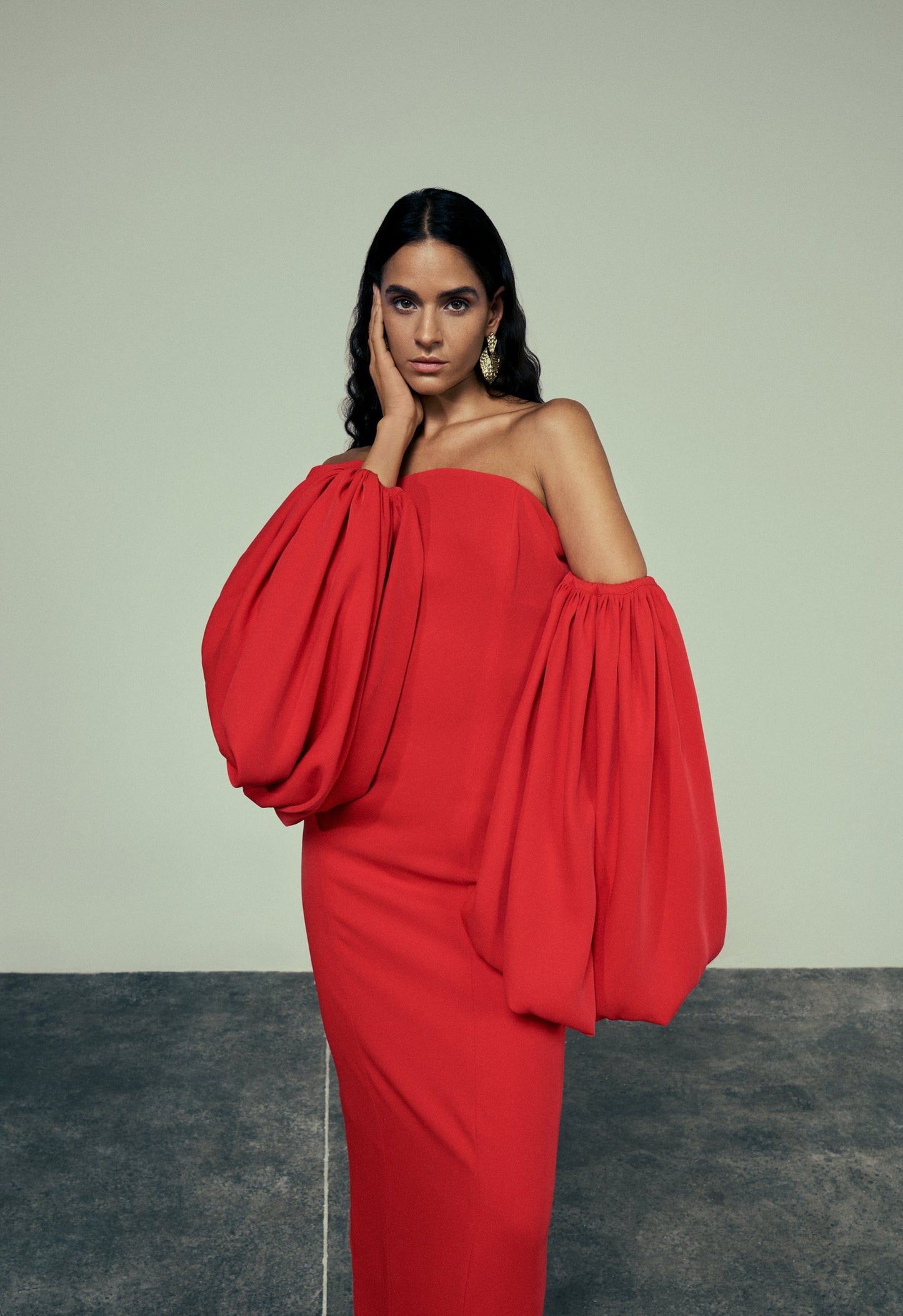 Red gown with puffed sleeves